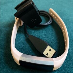 Fitbit Alta fitness tracker with charger